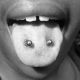 frog-eyes-tongue-body-piercing