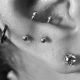 helix-anti-tragus-lobe-piercing